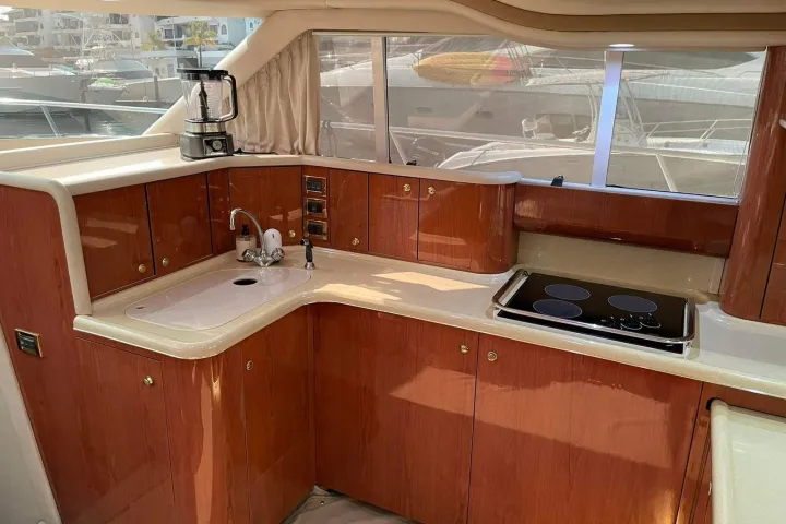 a kitchen with a sink and a window