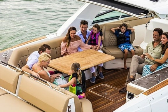 a group of people sitting on a boat