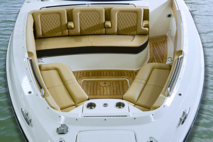 a boat sitting on top of a car