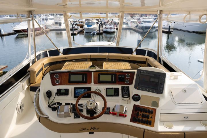 a boat is docked next to a body of water