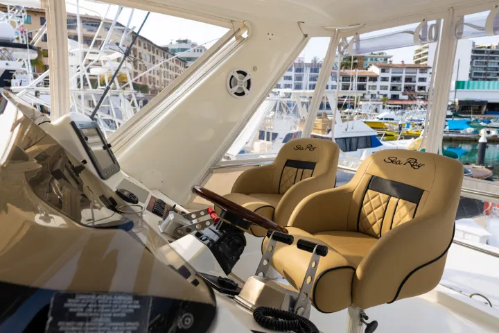 a person sitting at a table in front of a mirror