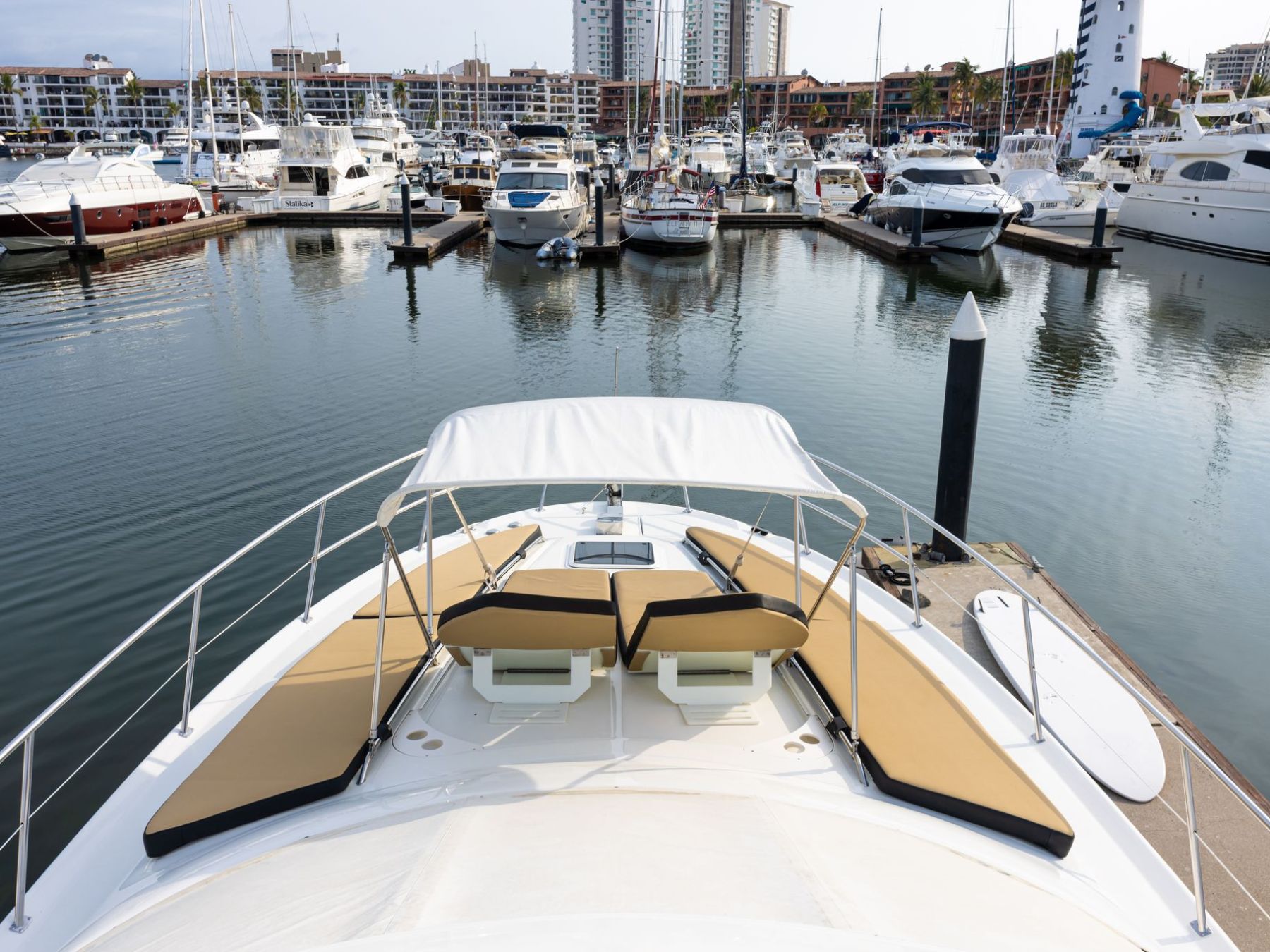 a boat is docked next to a body of water