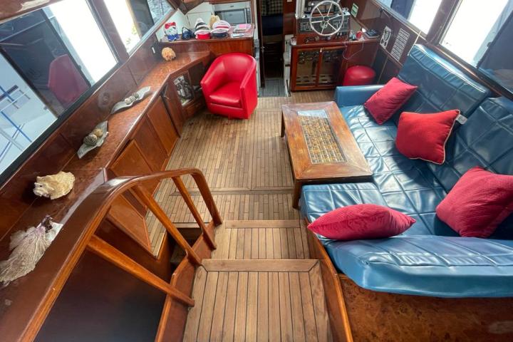 a chair sitting in front of a wooden table