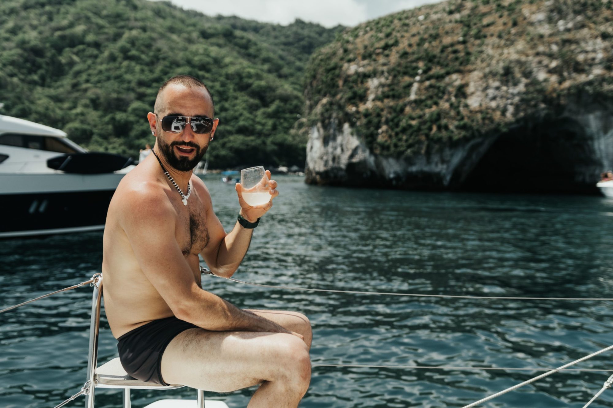 pfFdYeJg a man standing next to a body of water