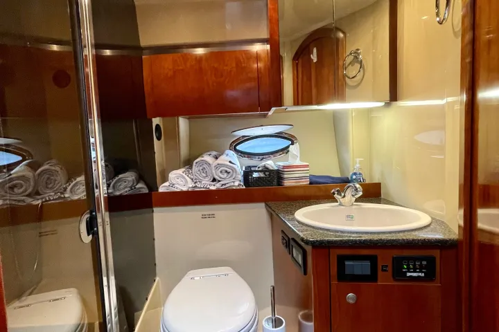 a kitchen with a sink and a mirror