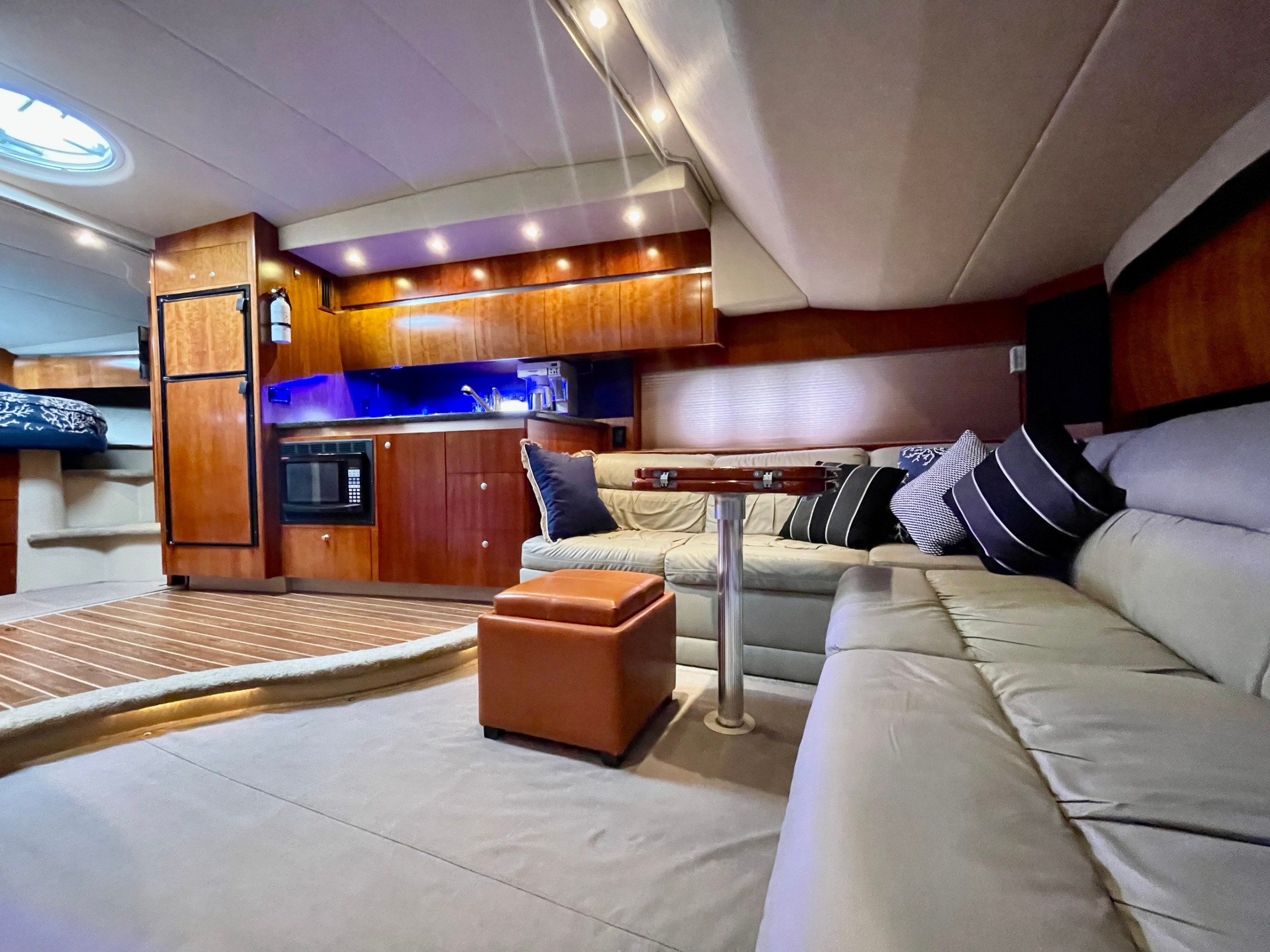 a bedroom with a bed and desk in a room