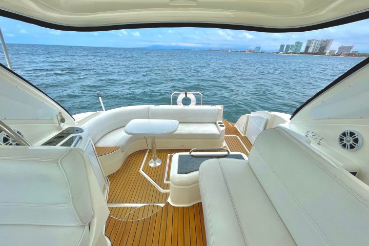 a boat sitting on top of a body of water