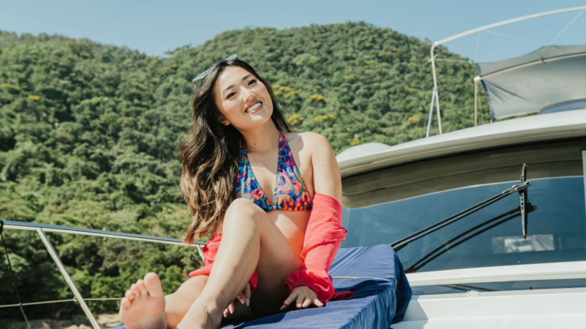 a woman sitting on a bench