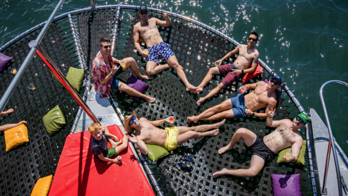 a group of people on a boat in the water