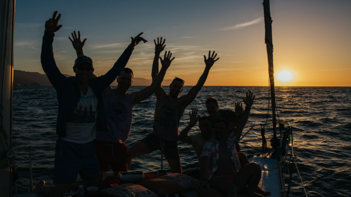 a person standing next to a body of water