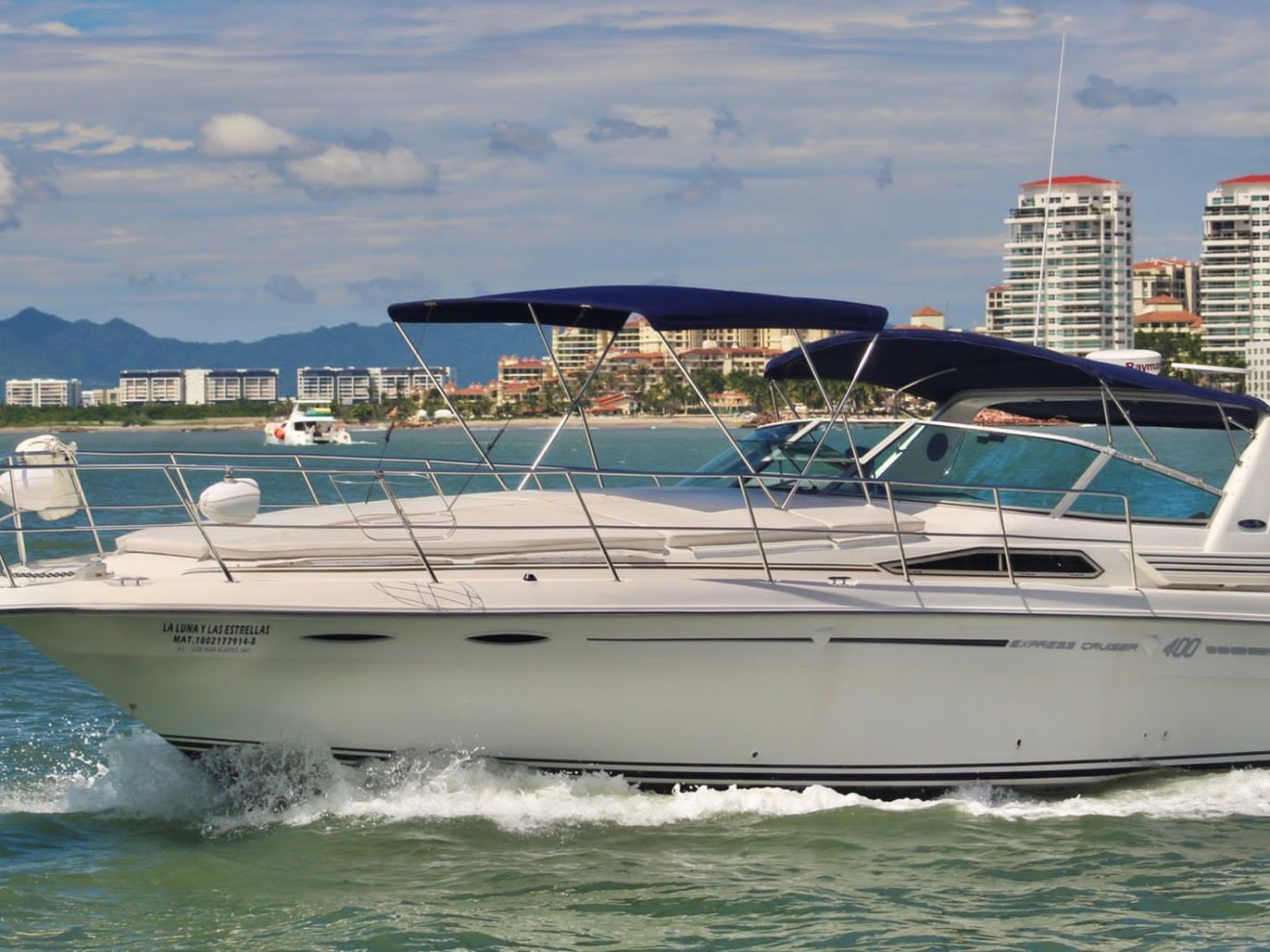 a small boat in a large body of water