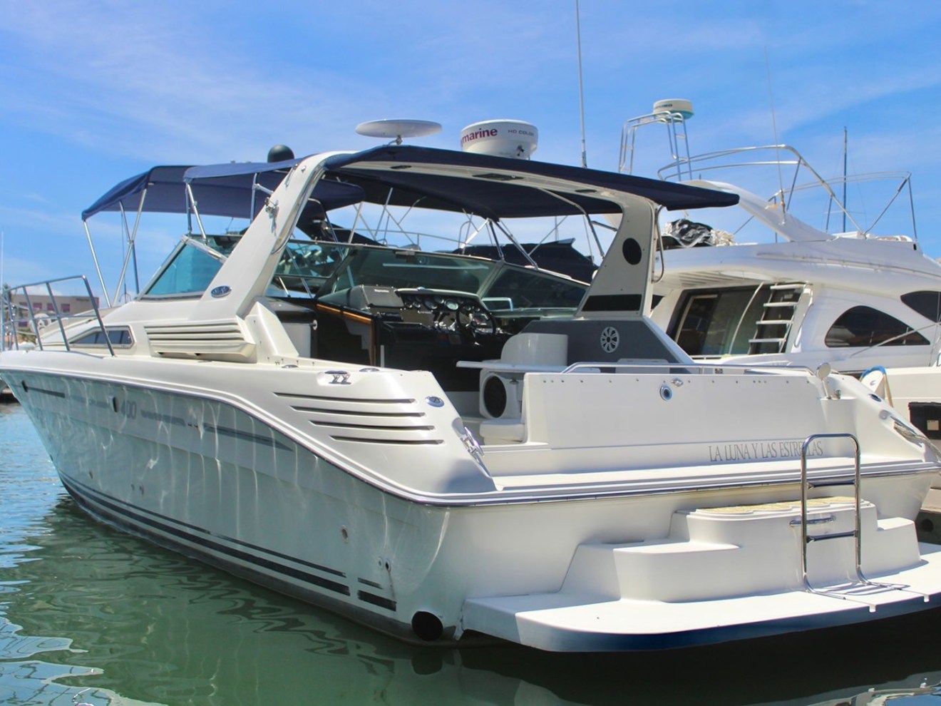 a boat is docked next to a body of water