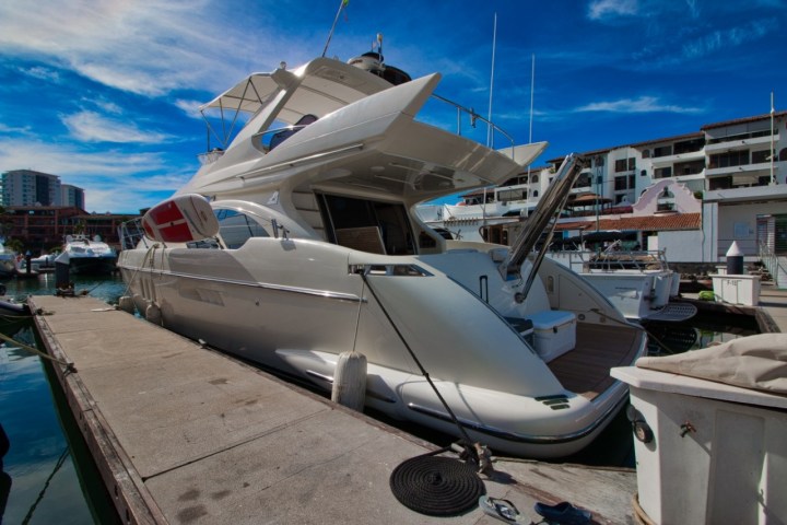 a small airplane is parked at a dock