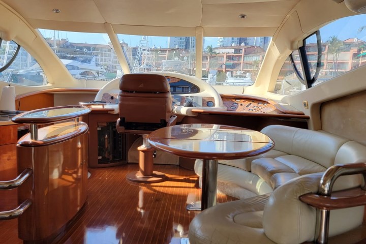 a dining room table in front of a window