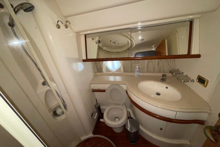 a restroom with a sink and a mirror