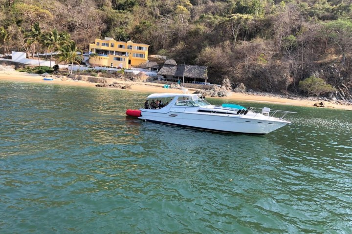 a small boat in a body of water