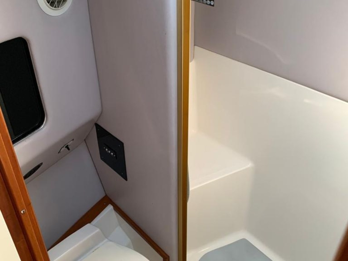 a restroom with a sink and a mirror