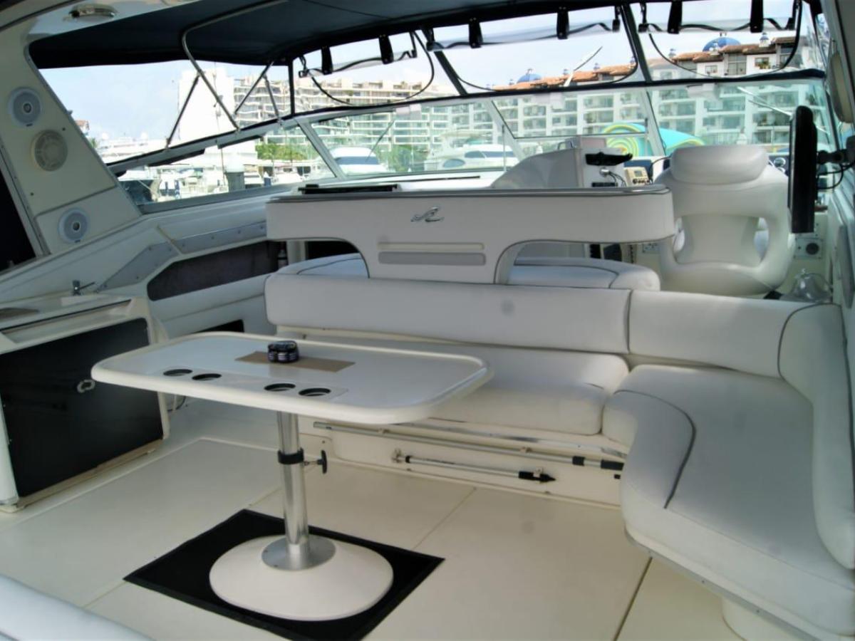 a boat sitting on top of a car