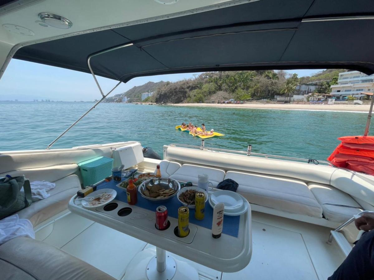a boat is docked next to a body of water