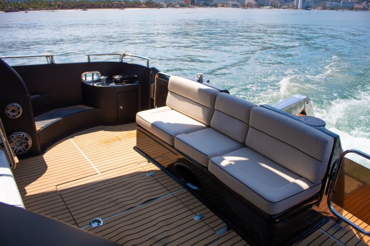 a wooden boat in a body of water