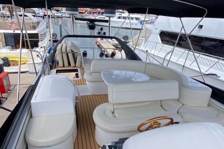 a boat sitting on top of a car