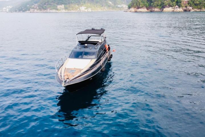 a small boat in a body of water