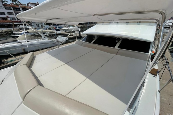 a boat sitting on top of a car