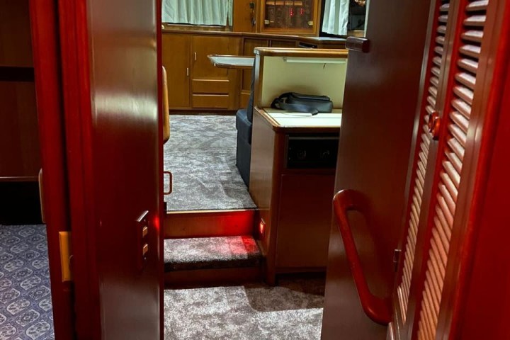 a stainless steel refrigerator in a room
