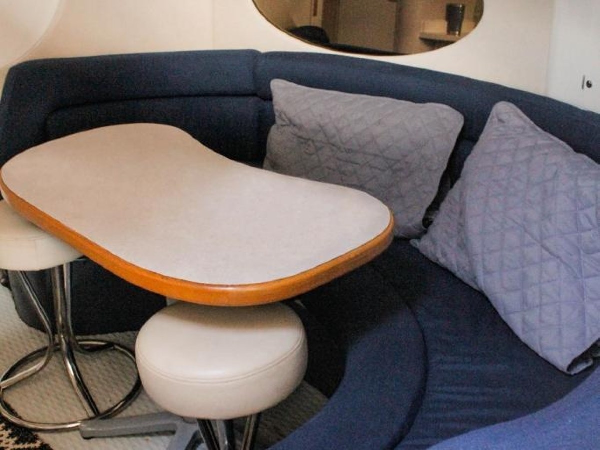 a desk with a chair in a room