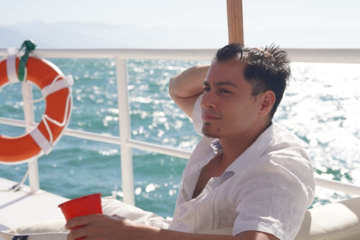 a person sitting at a beach