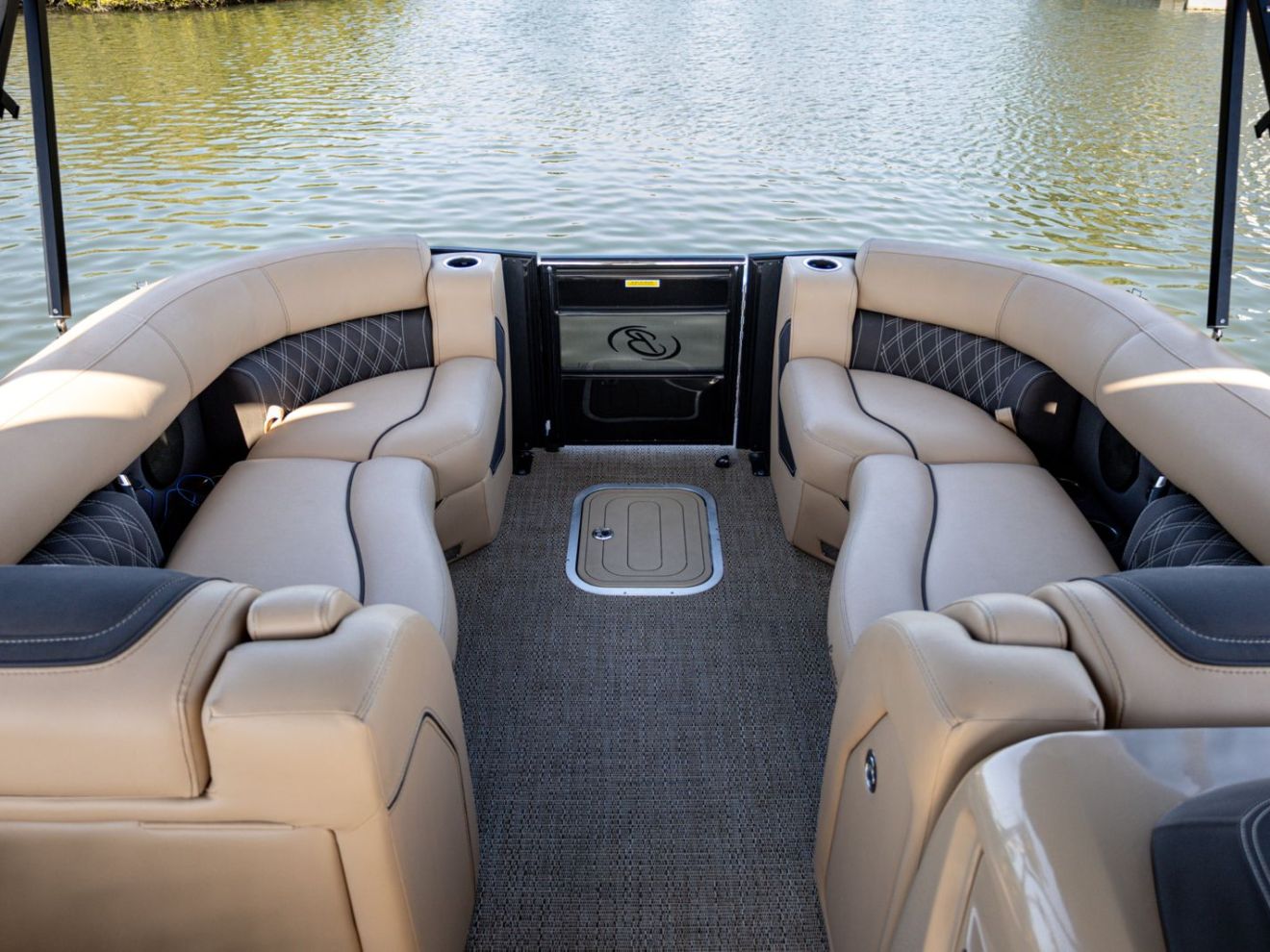 a chair sitting in front of a body of water