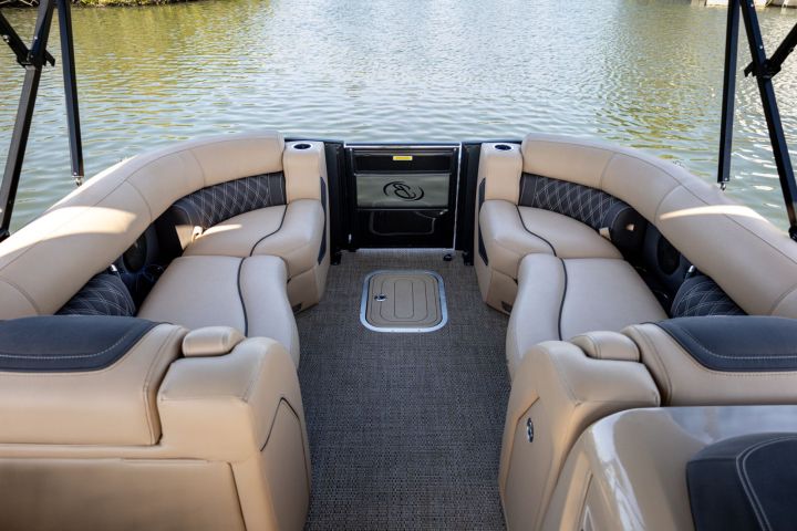 a chair sitting in front of a body of water