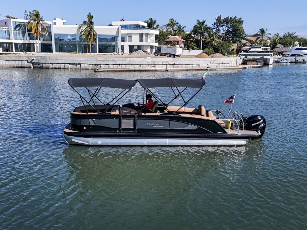 a small boat in a large body of water