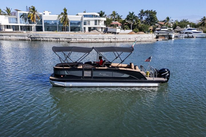 a small boat in a large body of water