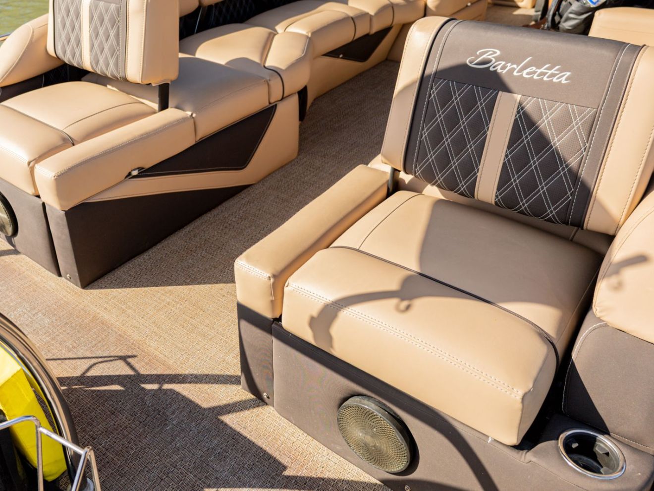 a desk with a laptop computer sitting on top of a table