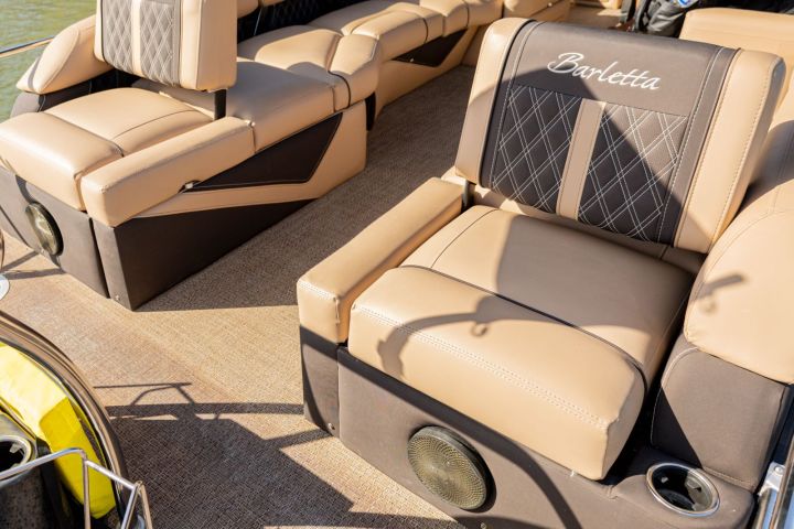 a desk with a laptop computer sitting on top of a table