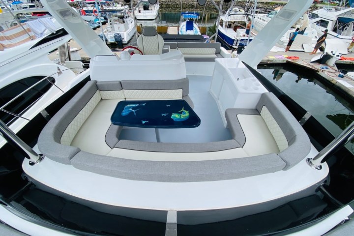 a boat sitting on top of a car