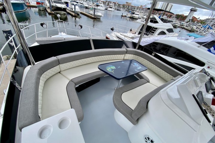 a boat sitting on top of a car