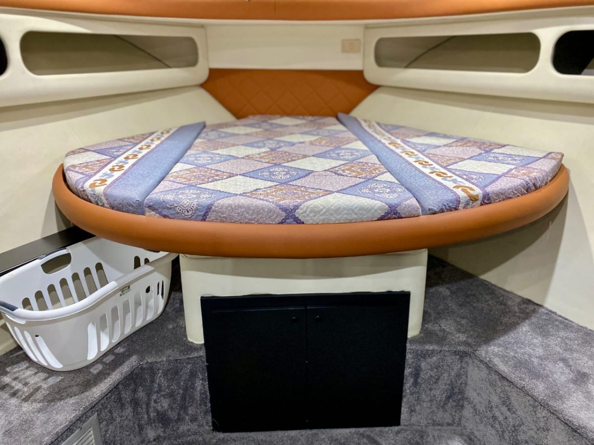a stove top oven sitting inside of a car