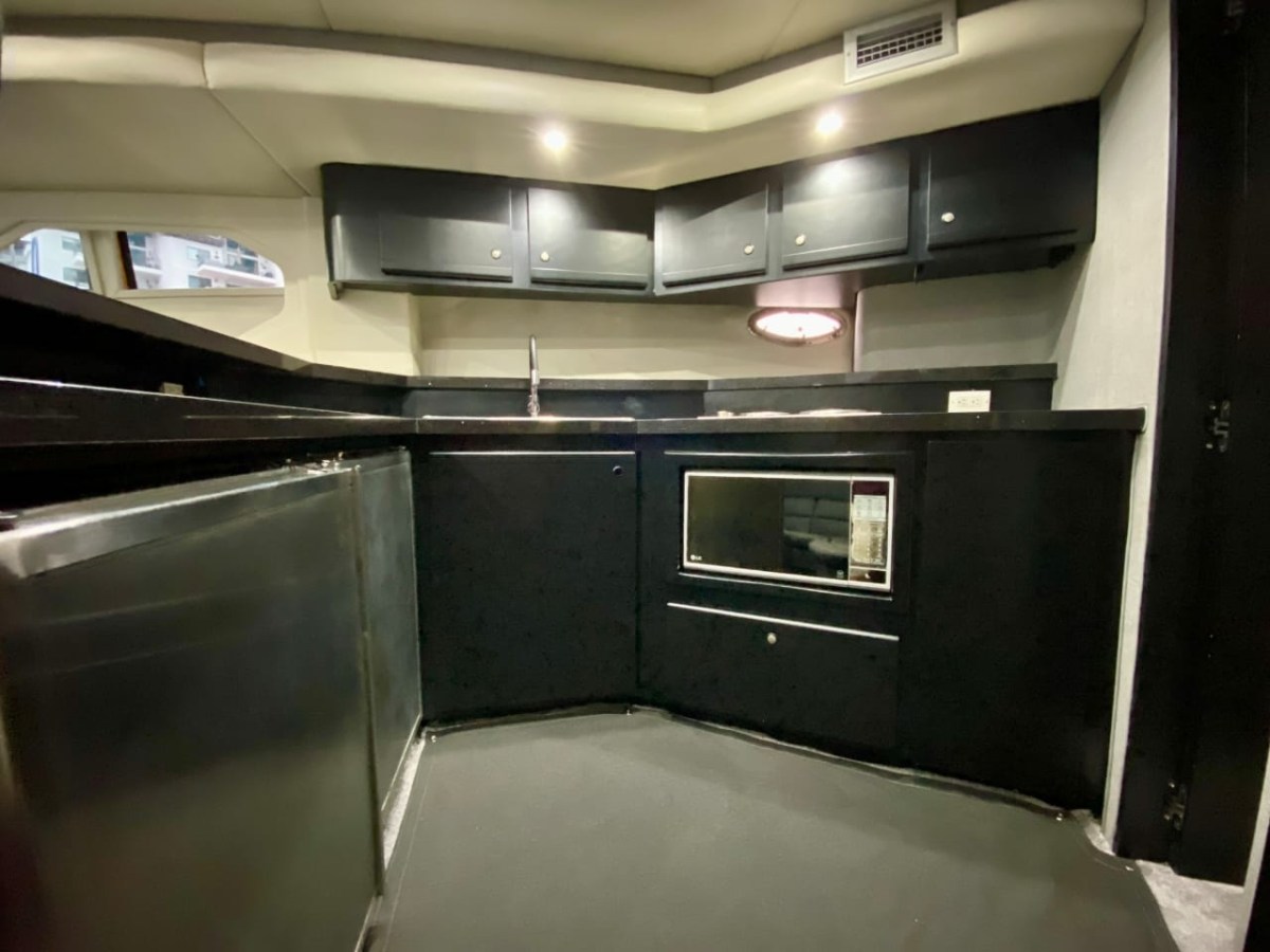 a large commercial kitchen with stainless steel appliances