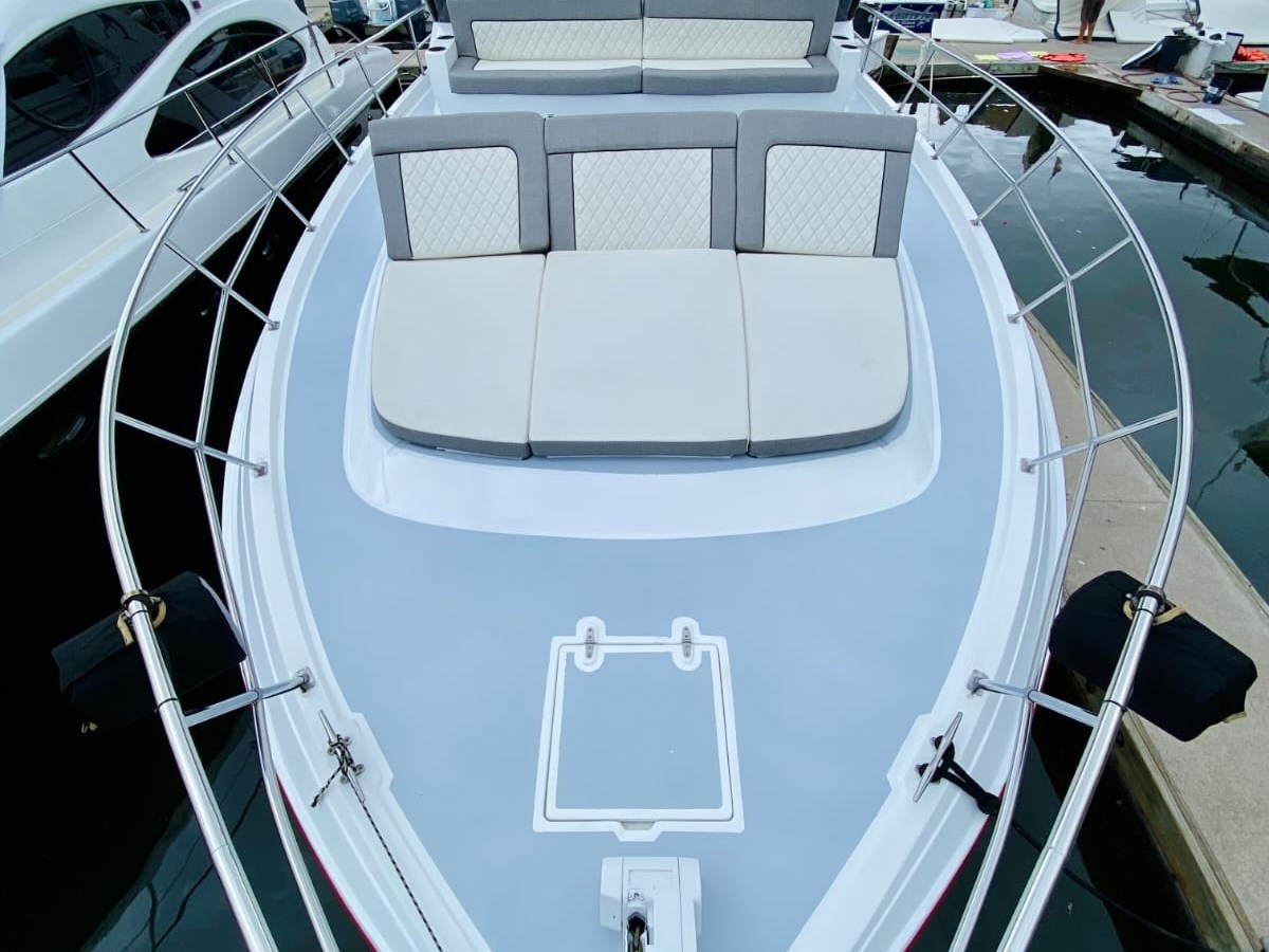 a boat docked next to a body of water