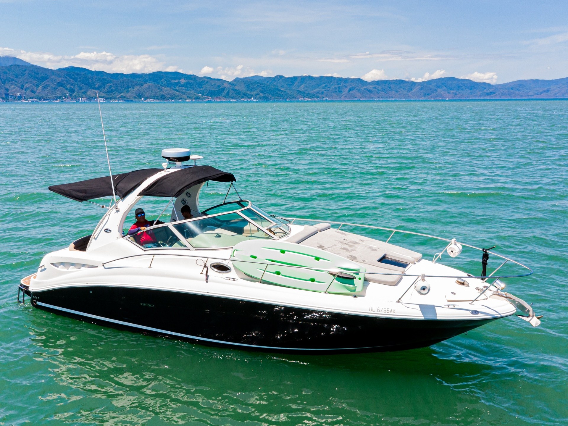 a small boat in a large body of water