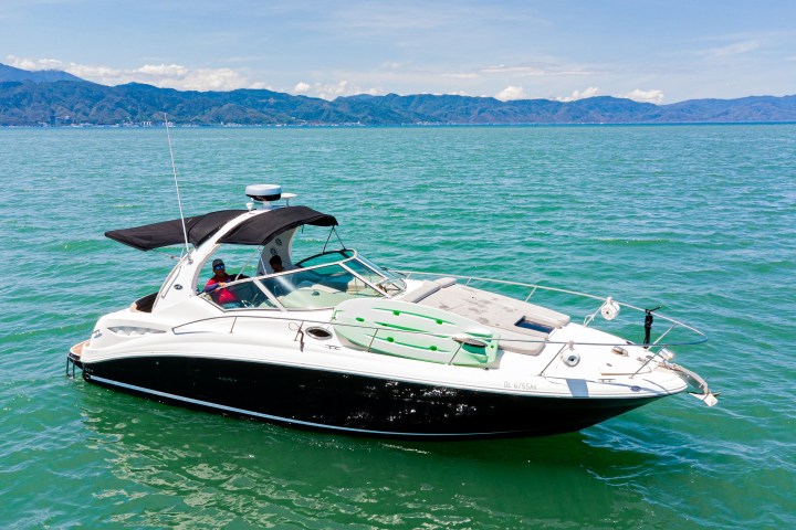 a small boat in a large body of water