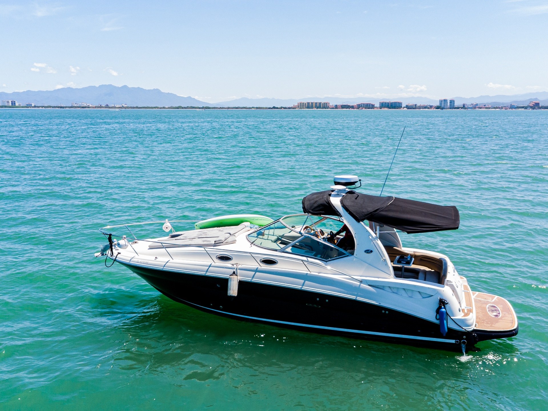a small boat in a body of water